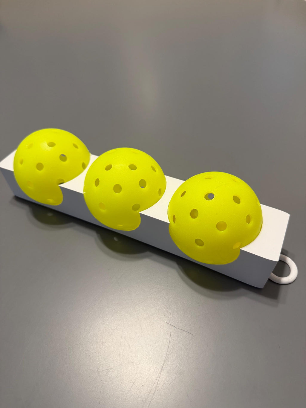Pickleball 3 Ball Holder with Carabiner to attach to your backpack, fence, or hip - durable and secure